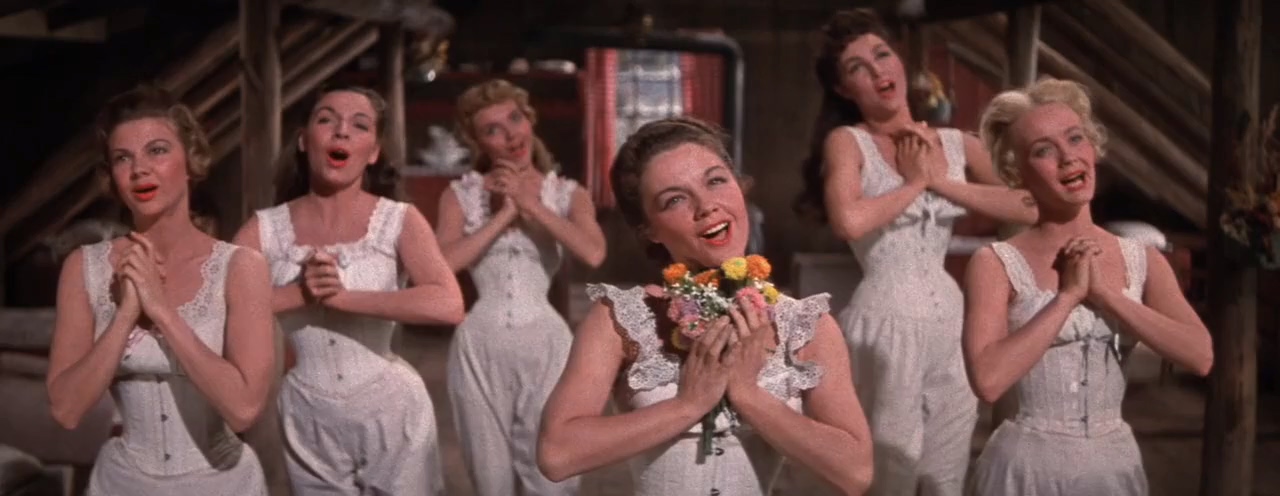 Betty Carr, Norma Doggett, Virginia Gibson, Nancy Kilgas, Ruta Lee, and Julie Newmar in Seven Brides for Seven Brothers (1954)