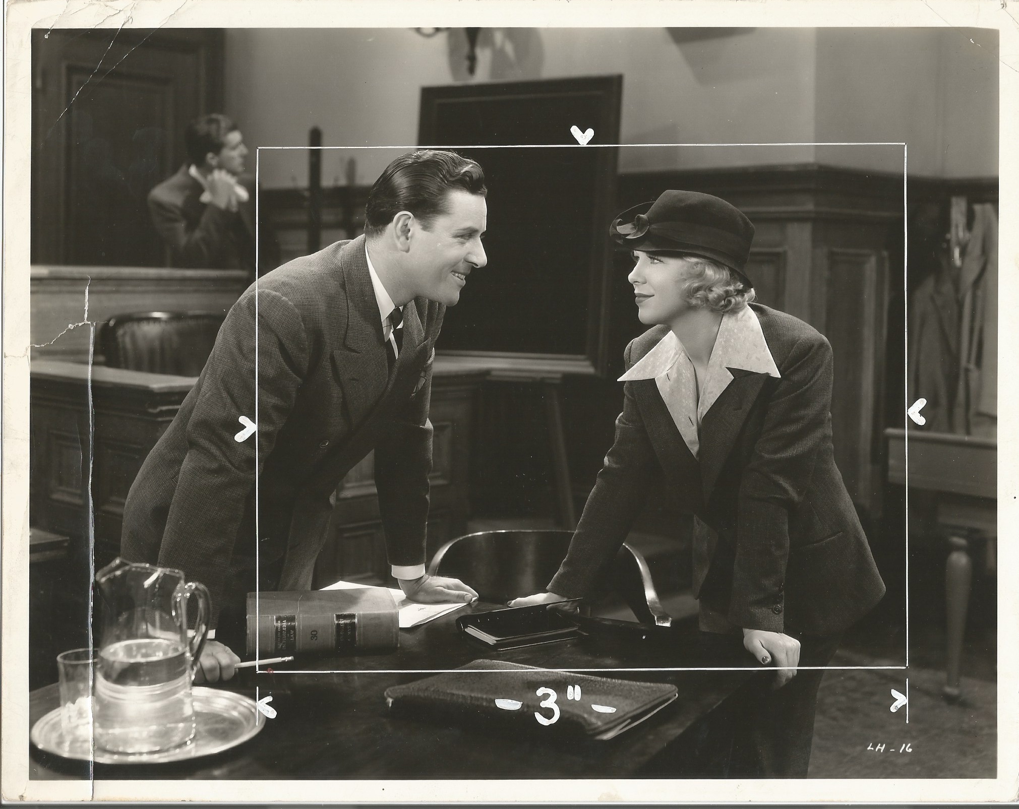 Glenda Farrell and Warren Hull in The Law in Her Hands (1936)