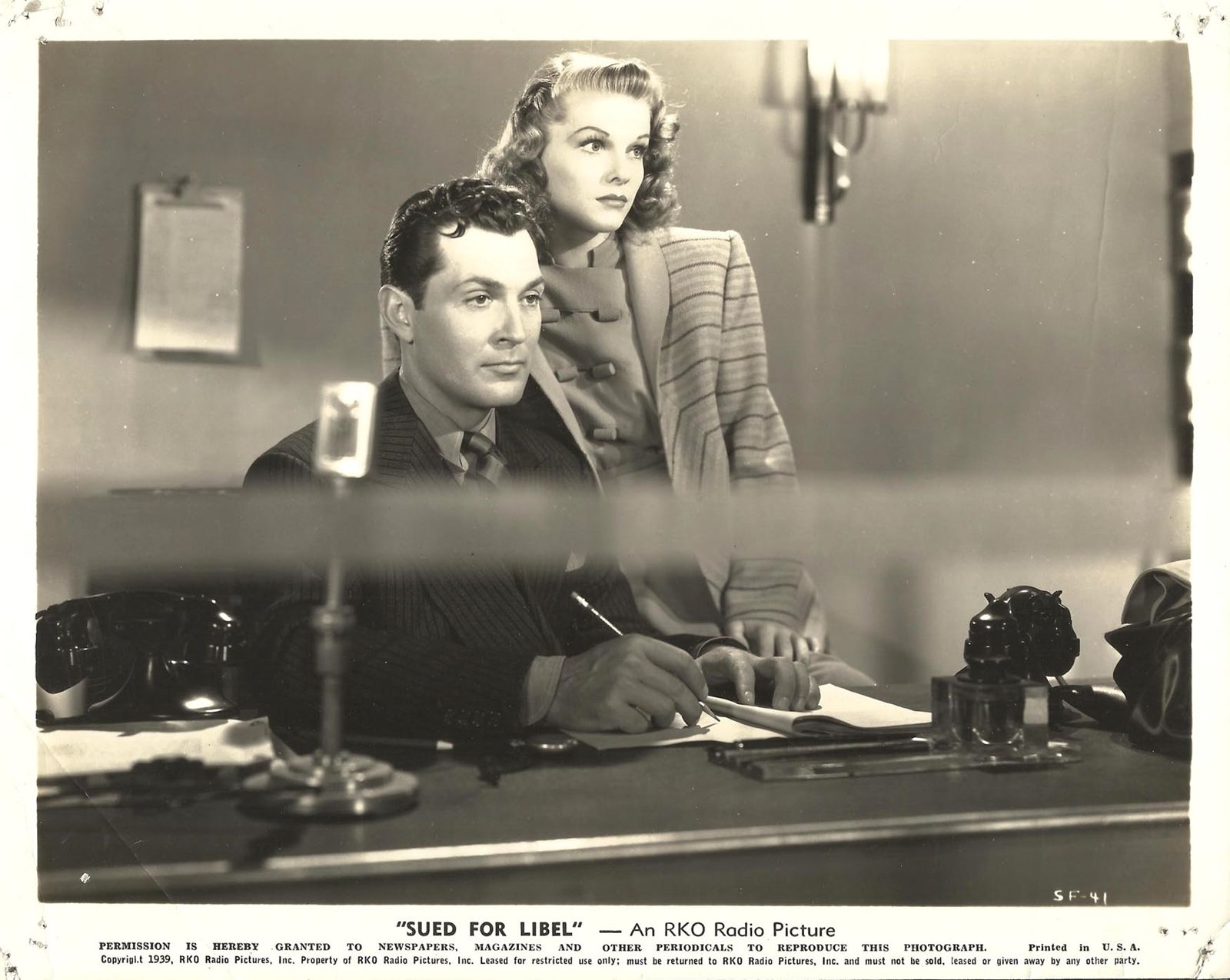 Linda Hayes and Kent Taylor in Sued for Libel (1939)