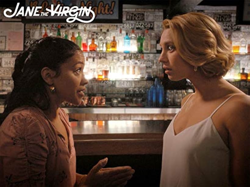 Gina Rodriguez and Yael Grobglas in Jane the Virgin (2014)