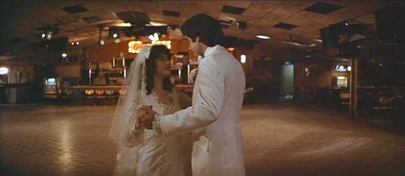 John Travolta and Debra Winger in Urban Cowboy (1980)