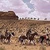 John Wayne, Ward Bond, Harry Carey Jr., Jeffrey Hunter, Pipe Line Begishe, Exactly Sonnie Betsuie, Henry Brandon, Ken Curtis, Pete Grey Eyes, and John Qualen in The Searchers (1956)