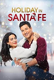 Mario Lopez and Emeraude Toubia in Holiday in Santa Fe (2021)