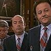 Lino Banfi, Massimo Boldi, and Paolo Villaggio in Scuola di ladri (1986)