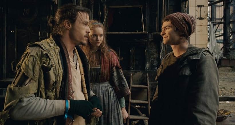 Heath Ledger, Andrew Garfield, and Lily Cole in The Imaginarium of Doctor Parnassus (2009)