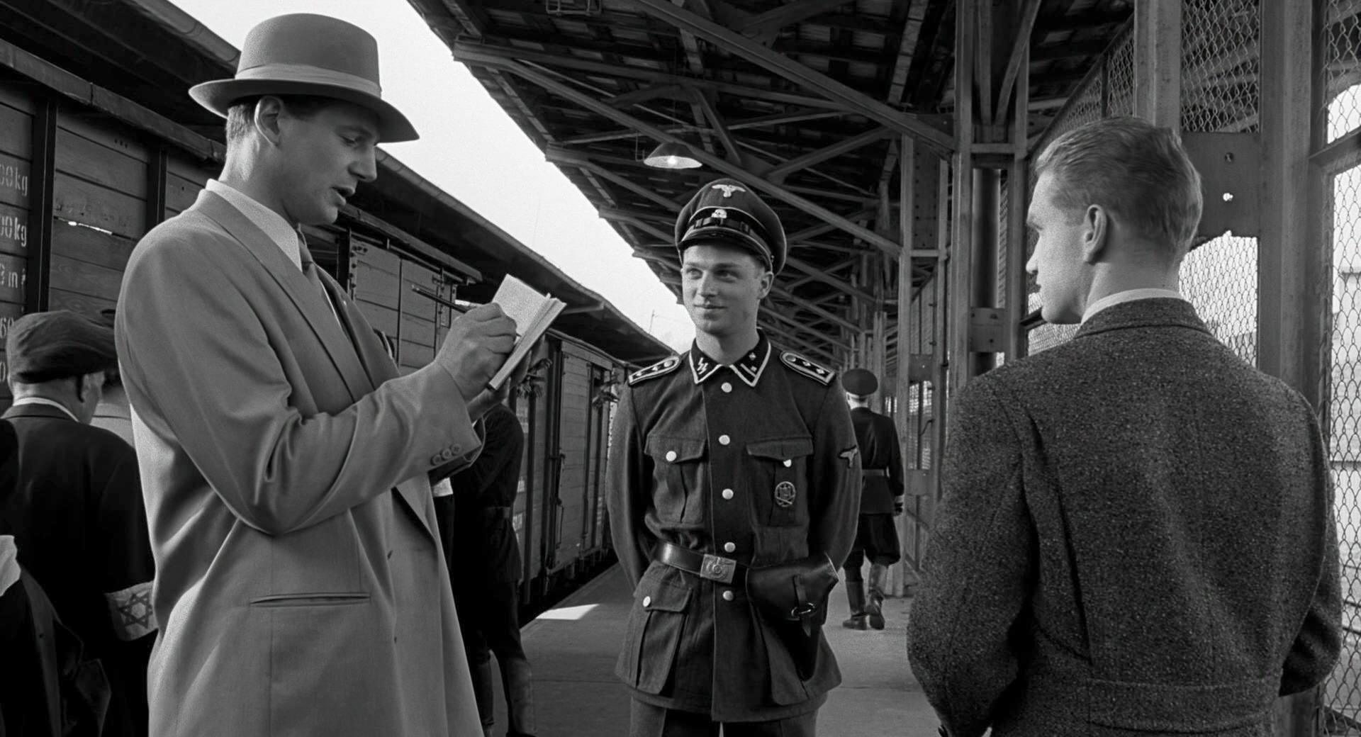 Liam Neeson, Joachim Paul Assböck, and Grzegorz Damiecki in Schindler's List (1993)