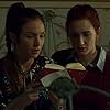 Dominique Provost-Chalkley and Katherine Barrell in Wynonna Earp (2016)