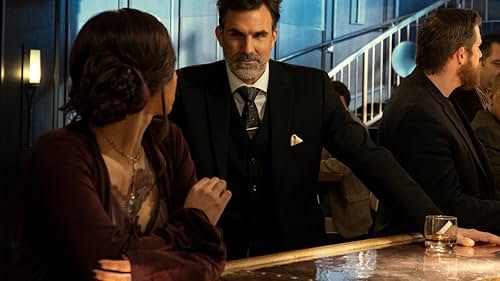 Paul Schneider and Jahkara Smith in The Hourglass (2020)