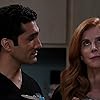 Sarah Rafferty and Dominic Rains in Secret Santa Has a Gift for You (2021)