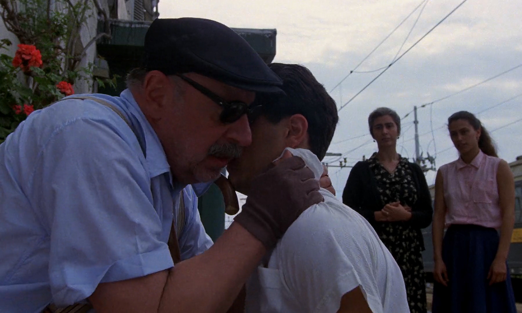 Antonella Attili, Roberta Lena, Marco Leonardi, and Philippe Noiret in Cinema Paradiso (1988)