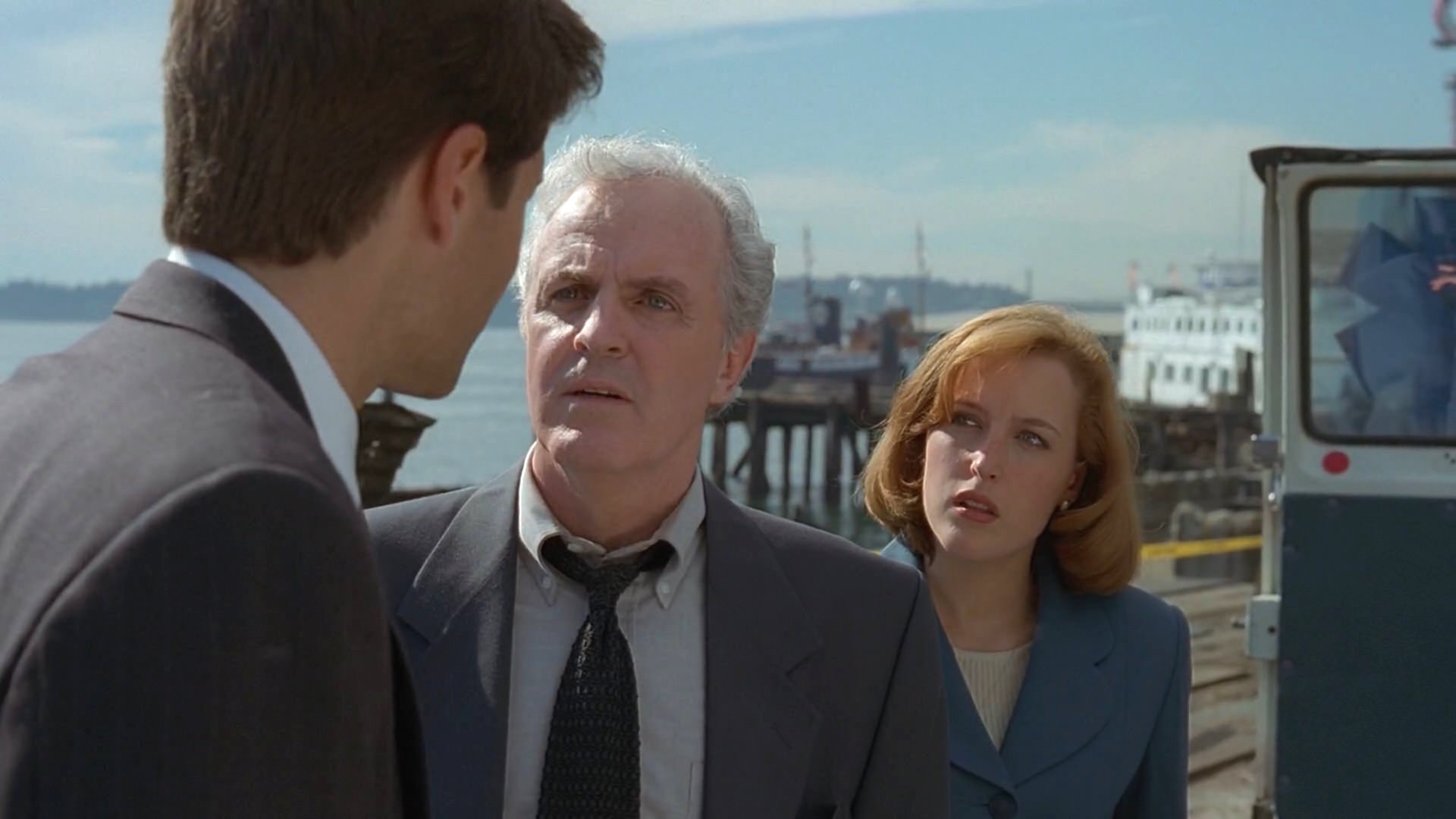 Gillian Anderson, David Duchovny, and James Handy in The X-Files (1993)