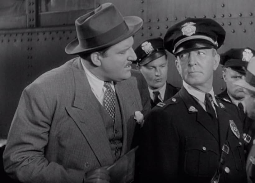 Laird Cregar and Edwin Stanley in This Gun for Hire (1942)