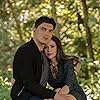 Alyssa Milano and Zane Holtz in Tempting Fate (2019)