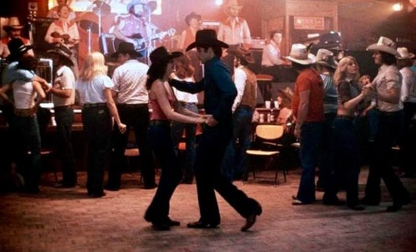 John Travolta and Debra Winger in Urban Cowboy (1980)