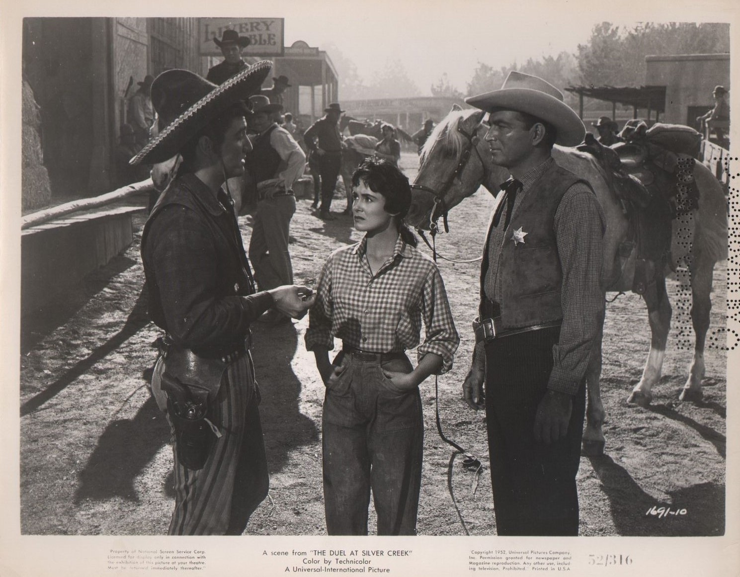 Susan Cabot, Eugene Iglesias, and Stephen McNally in The Duel at Silver Creek (1952)