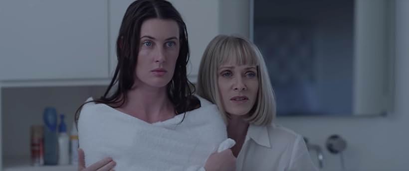 Barbara Crampton and Sarah Hagan in Sun Choke (2015)