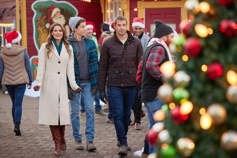 Chelsea Hobbs, Stephen Huszar, and Everett Andres in Navigating Christmas (2023)