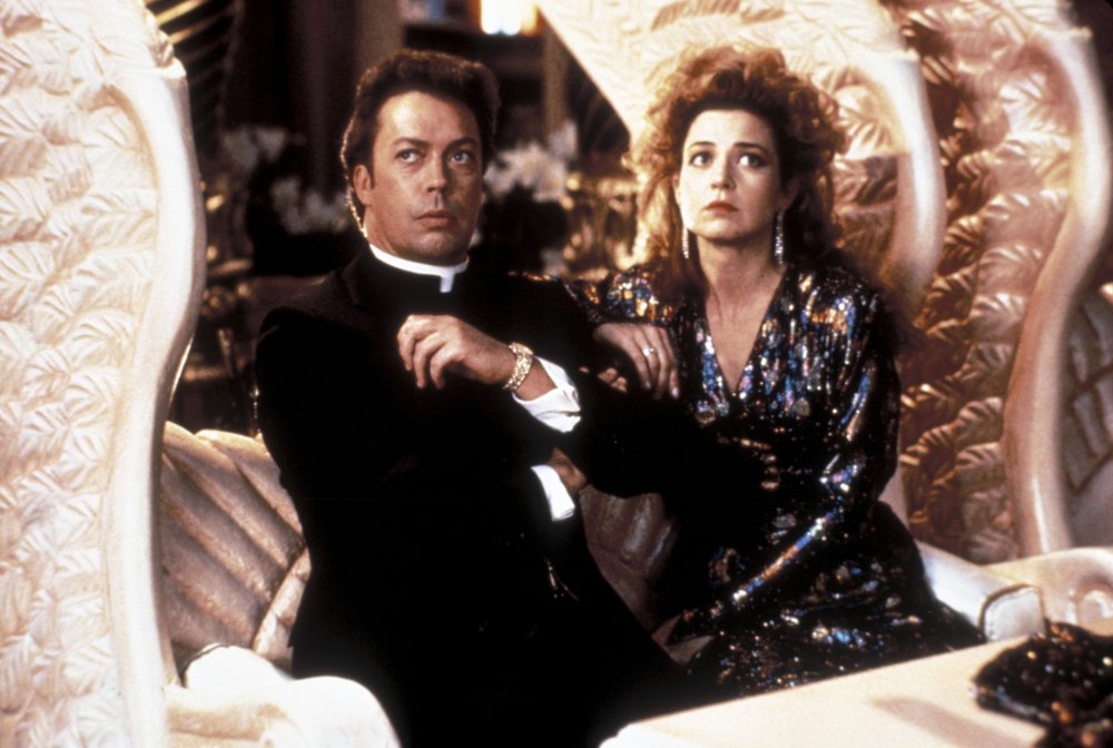 Tim Curry and Annie Potts in Pass the Ammo (1987)