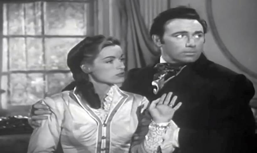 Lilyan Chauvin and Scott Forbes in The Adventures of Jim Bowie (1956)