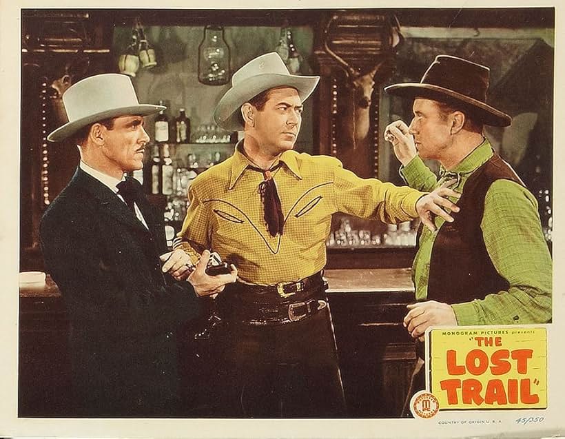 Johnny Mack Brown, Kenneth MacDonald, and Eddie Parker in The Lost Trail (1945)