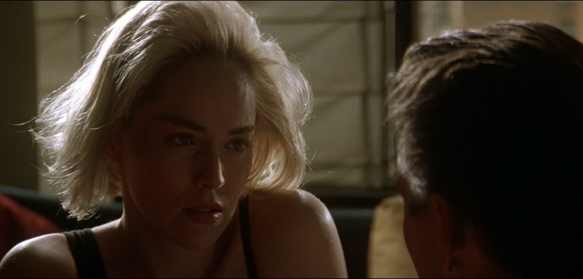 Sharon Stone and Tom Berenger in Sliver (1993)