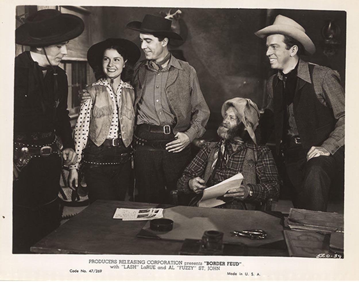 Kenneth Farrell, Lash LaRue, Gloria Marlen, Buster Slaven, and Al St. John in Border Feud (1947)