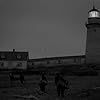 Willem Dafoe, Shaun Clarke, Robert Pattinson, and Pierre Richard in The Lighthouse (2019)