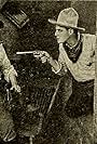 J. Warren Kerrigan and Jack Richardson in The Badge of Honor (1913)