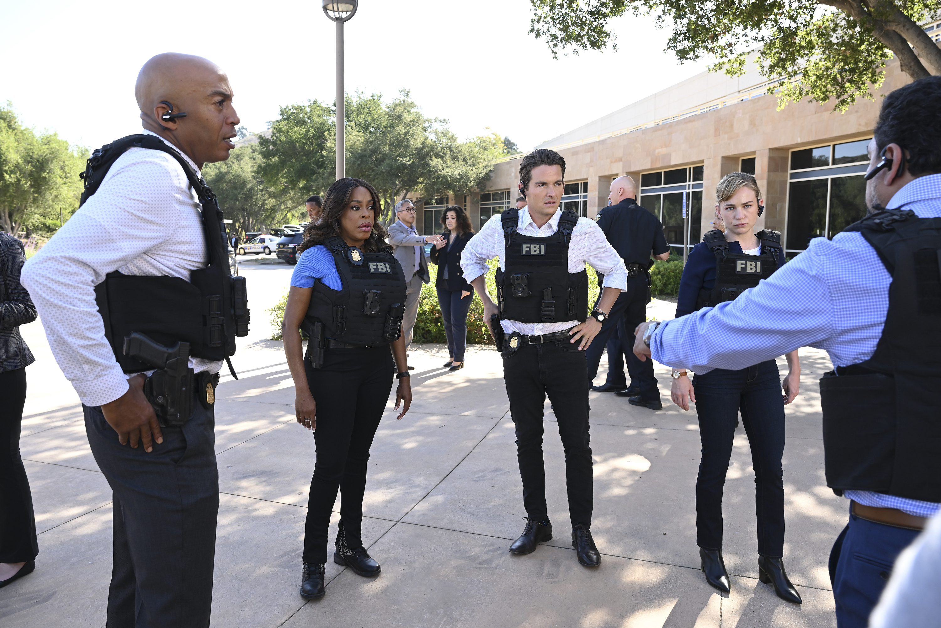 James Lesure, Niecy Nash, Felix Solis, Kevin Zegers, and Britt Robertson in The Rookie: Feds (2022)