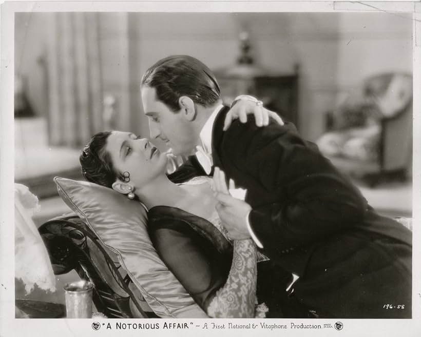 Basil Rathbone and Kay Francis in A Notorious Affair (1930)