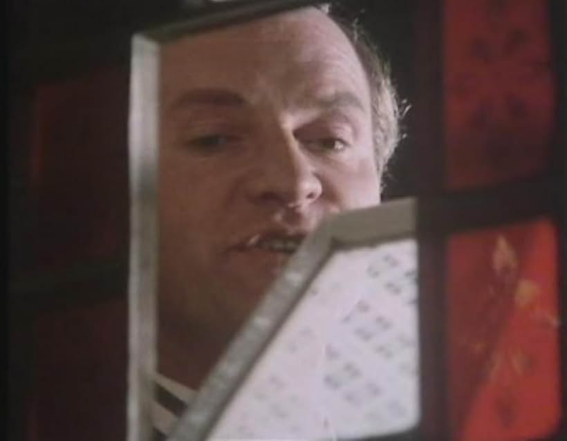 Christopher Neame in Quiller (1975)