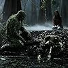 Derek Mears and Crystal Reed in Swamp Thing (2019)