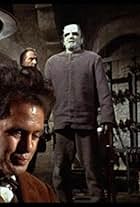 Peter Cushing, Sandor Elès, Kiwi Kingston, and Peter Woodthorpe in The Evil of Frankenstein (1964)