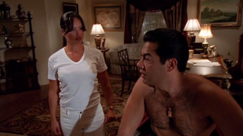 Carlos Gómez and Autumn Paul in The Invisible Man (2000)