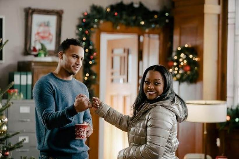 Keshia Knight Pulliam and Michael Xavier in Radio Christmas (2019)