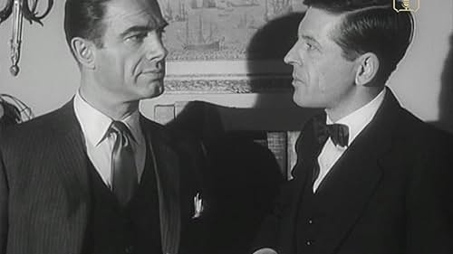 Charles Korvin and Edwin Richfield in Interpol Calling (1959)