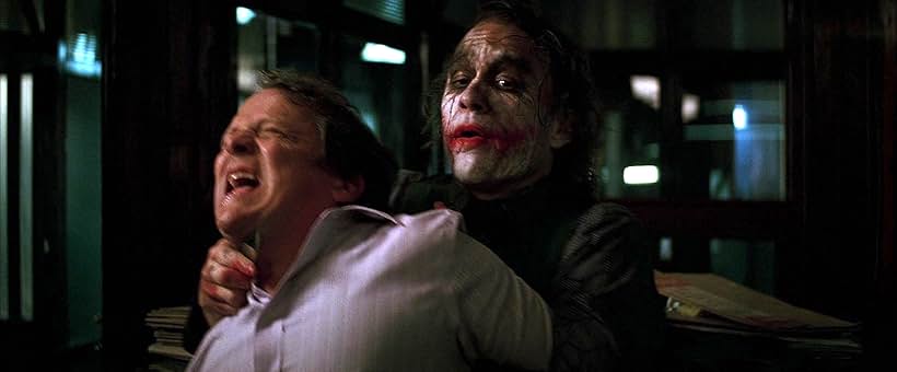 Heath Ledger and Keith Szarabajka in The Dark Knight (2008)