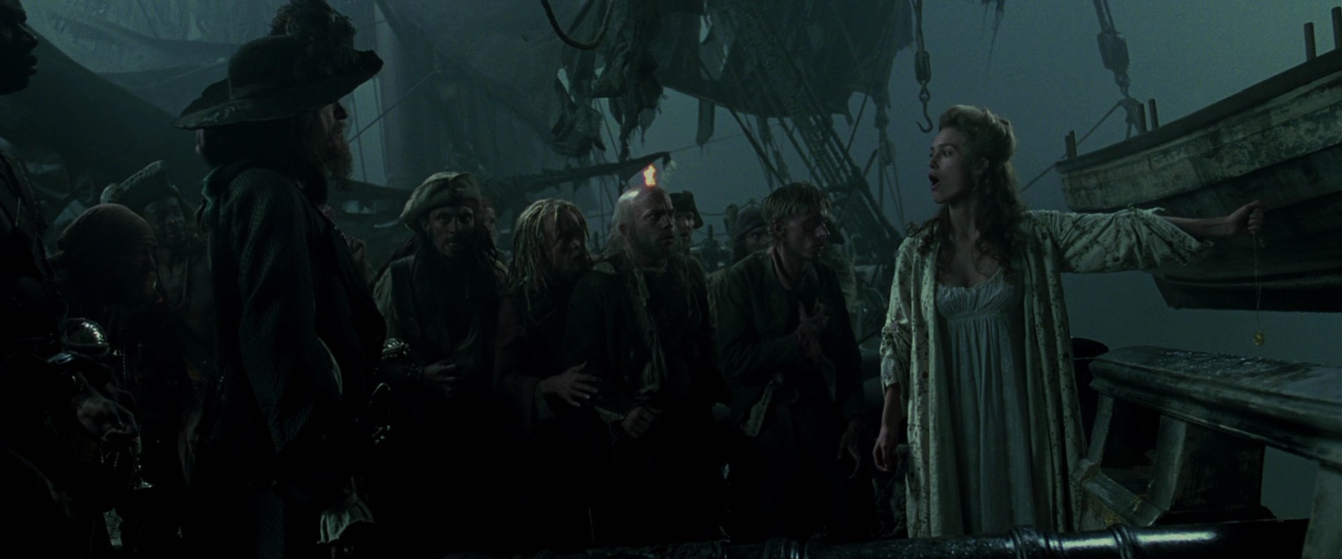 Geoffrey Rush, Lee Arenberg, Mackenzie Crook, Keira Knightley, Tommy Schooler, Isaac C. Singleton Jr., and Finneus Egan in Pirates of the Caribbean: The Curse of the Black Pearl (2003)