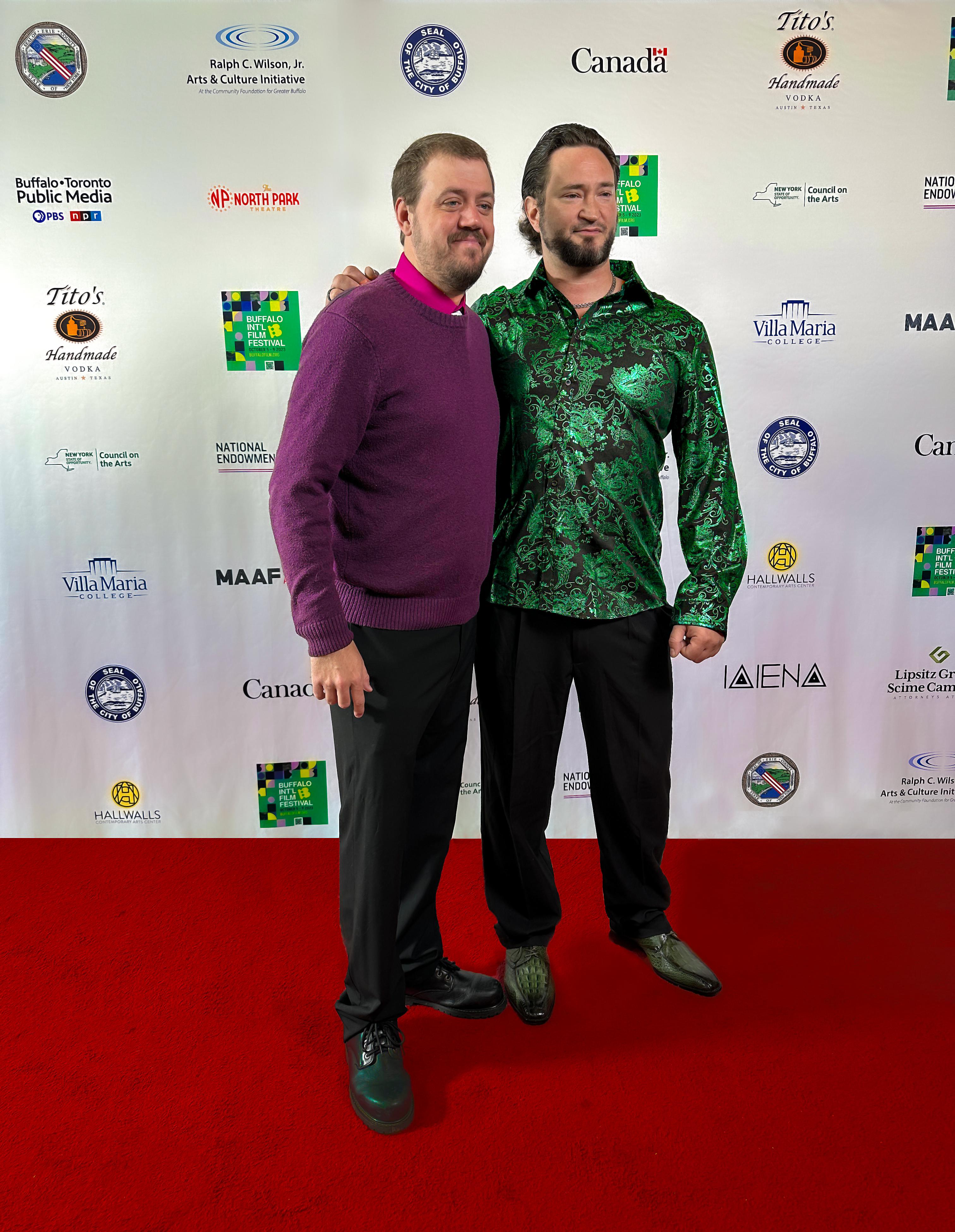 Jason John Beebe(Mark) and Director Adam Steigert spotted at the red-carpet for the 2023 Buffalo International Film Festival at a premiere for Heartbreak Falls. Read on: Jason recently spoke on the red-carpet for his upcoming release Heartbreak Falls. He had this to say about returning to the iconic role of Mark from the original film that left us on a cliffhanger.  “Wearing the Mark jacket and having it presented to me after wrapping was symbolic in a way. It was my first lead in a feature and validation that I did a good job. I never thought I'd be wearing it again to reprise the same role over 10 years later. But I'm ready to suit up!”