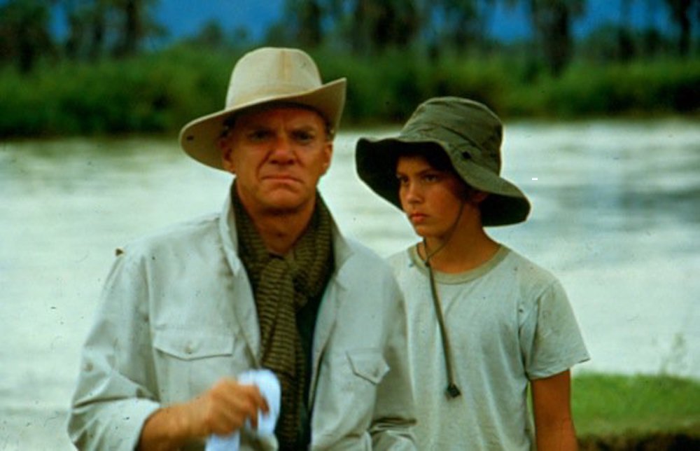 Malcolm McDowell and Mac Skinner in In the Eye of the Snake (1990)