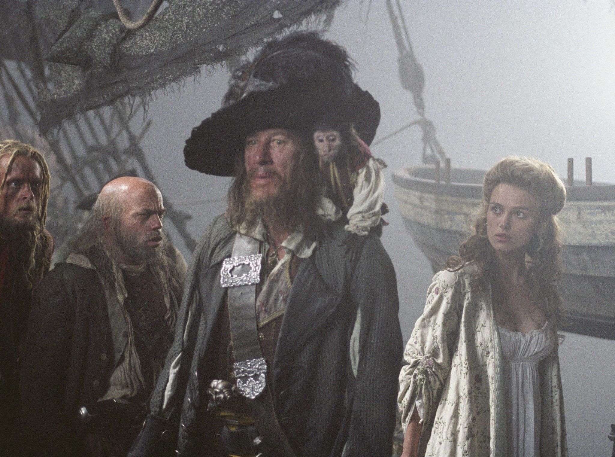 Geoffrey Rush, Lee Arenberg, Keira Knightley, and Finneus Egan in Pirates of the Caribbean: The Curse of the Black Pearl (2003)