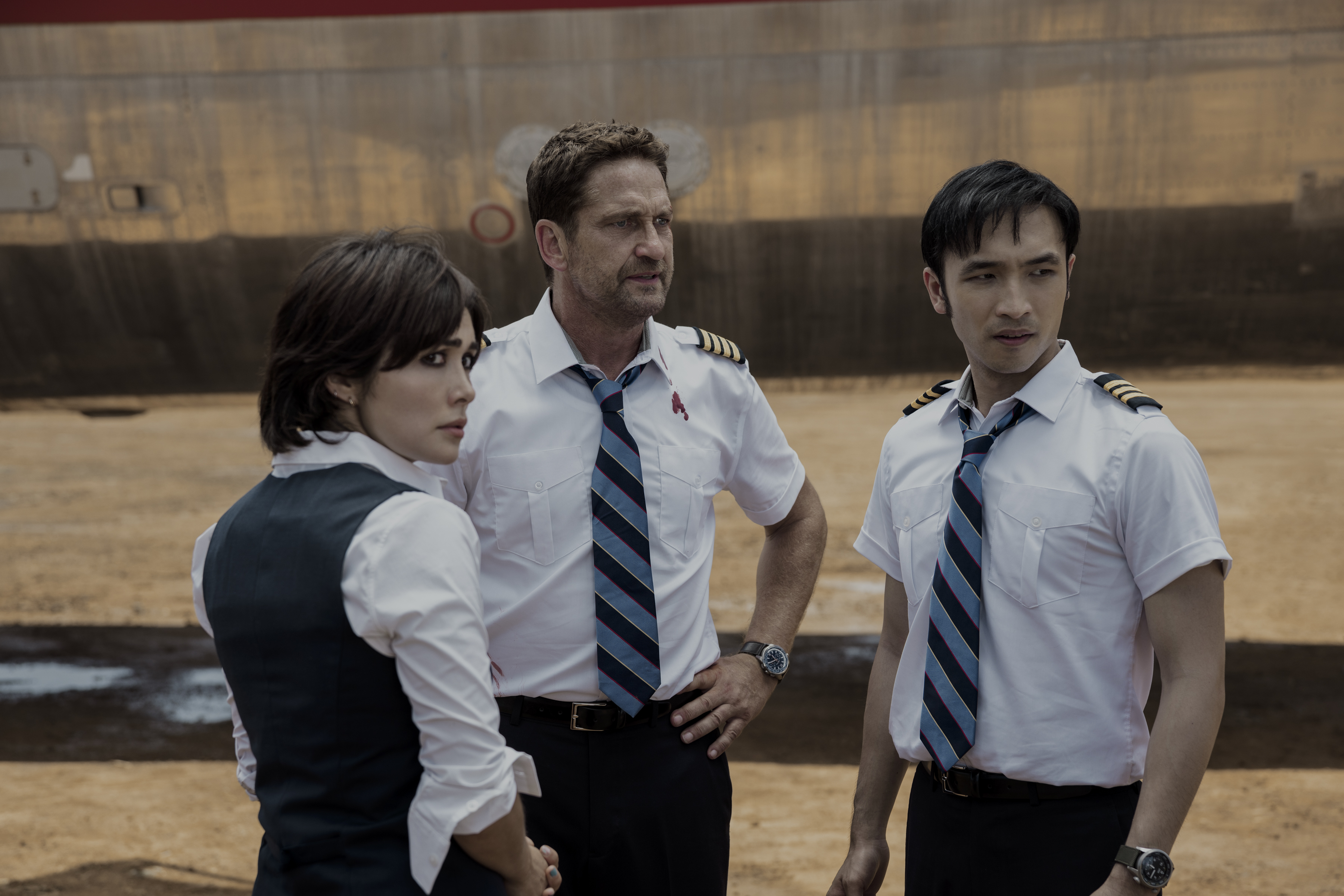 Gerard Butler, Daniella Pineda, and Yoson An in Plane (2023)