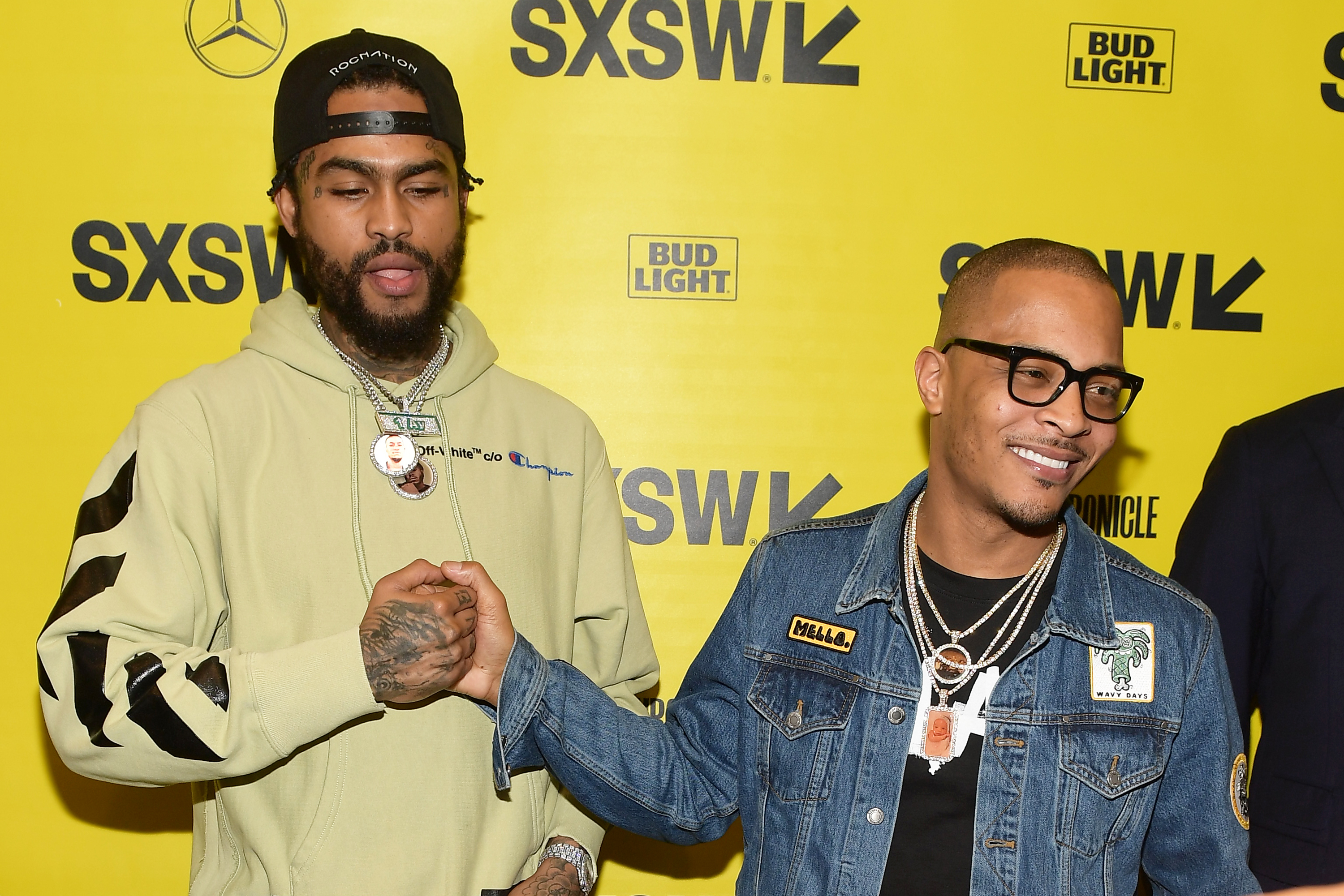 Tip 'T.I.' Harris and Dave East at an event for Rapture (2018)