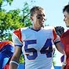 Darin Brooks and Alan Ritchson in Blue Mountain State (2010)