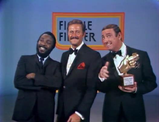 Dick Gregory, Dick Martin, and Dan Rowan in Rowan & Martin's Laugh-In (1967)