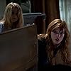 Bella Thorne and Mckenna Grace in Amityville: The Awakening (2017)