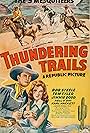 Jimmie Dodd, Nell O'Day, Bob Steele, and Tom Tyler in Thundering Trails (1943)