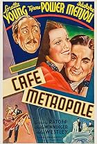 Tyrone Power, Adolphe Menjou, and Loretta Young in Café Metropole (1937)