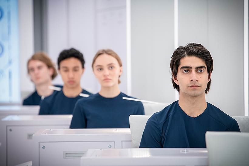 Vlad Ionut Popescu, Lily-Rose Depp, and Viveik Kalra in Voyagers (2021)