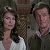 Roger Moore and Maud Adams in Octopussy (1983)